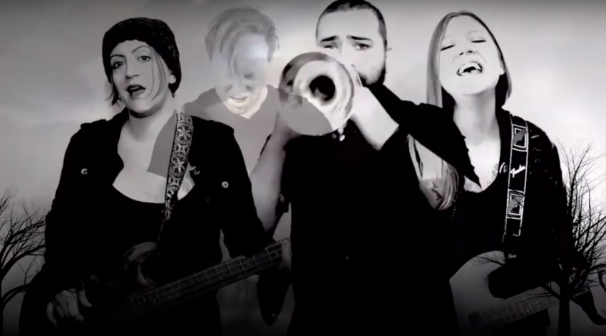 Four musicians in a black & white music video